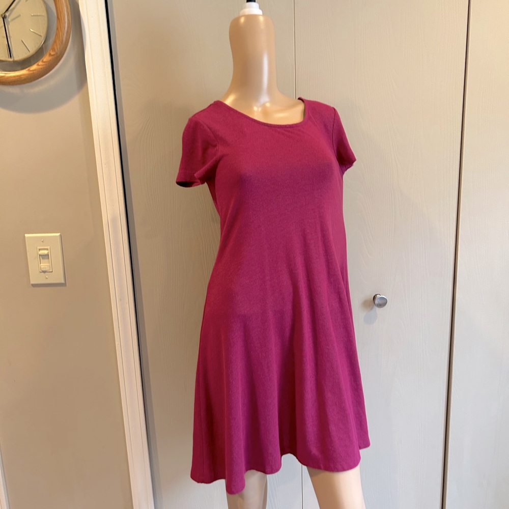 Ladies purple knit casual dress. Short sleeves above the knee.Everyday wear 31”